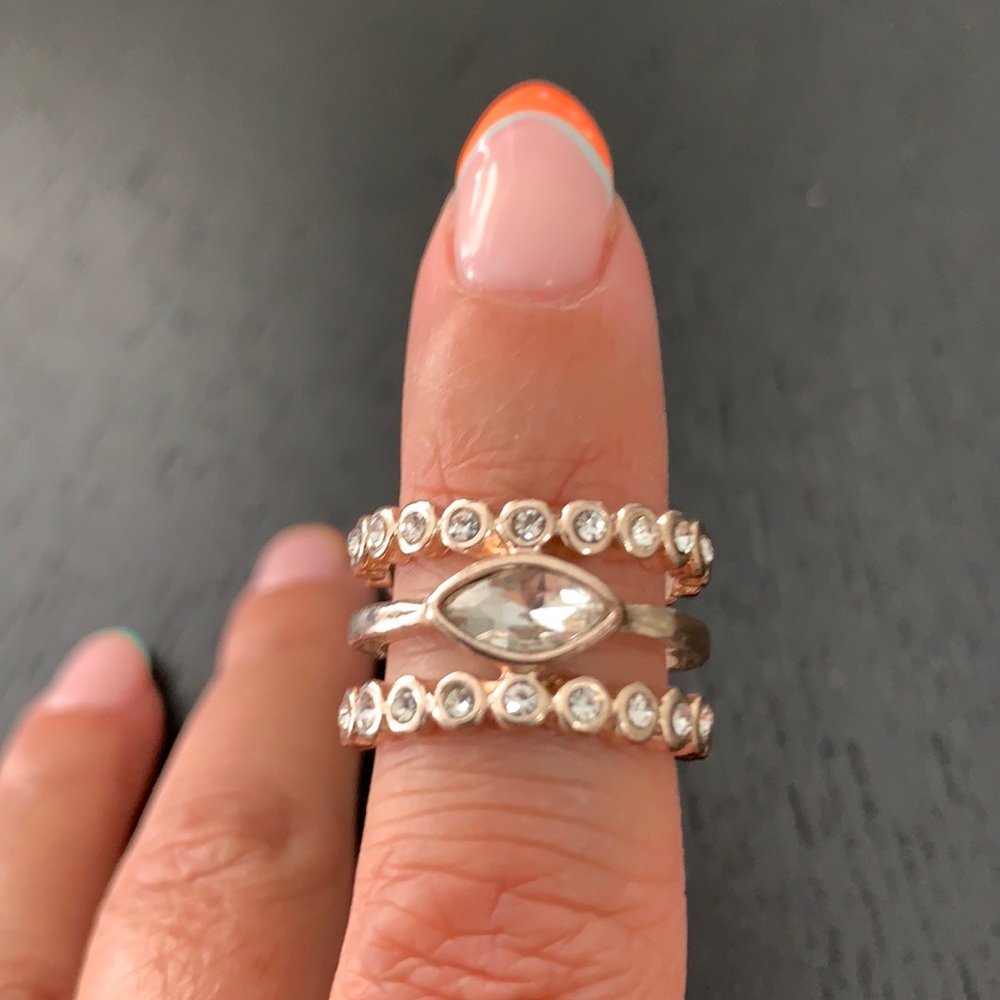 Luv AJ ring. One piece appears like 3- gold